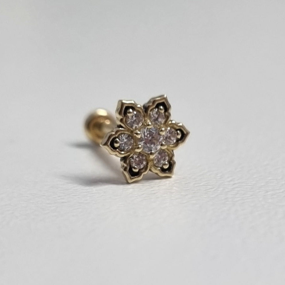 Screw-on flower piercing in yellow gold