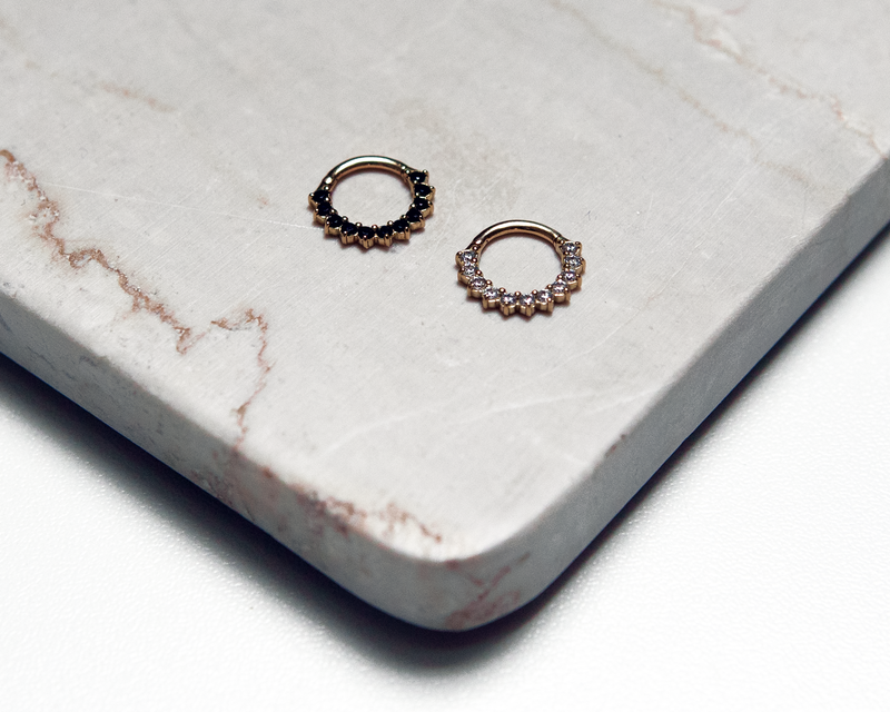 Premium yellow gold and black zircon clicker ring