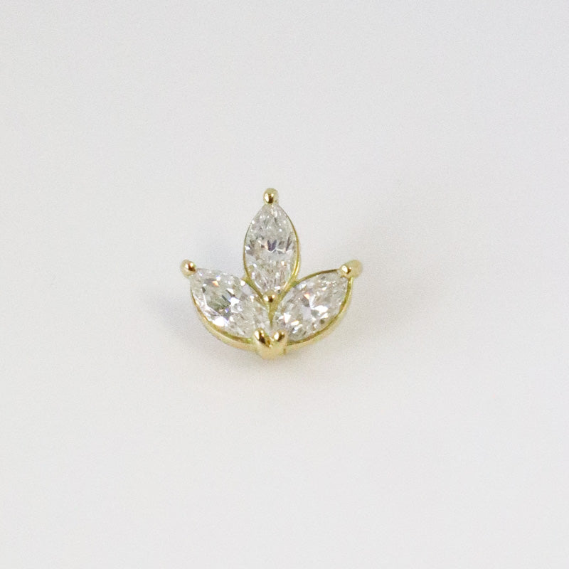 18-carat yellow gold ear piercing with flower and zircons