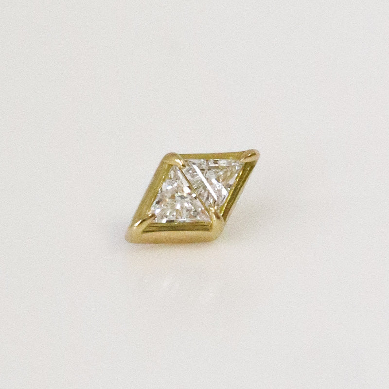 Diamond ear piercing with zircon set in yellow gold