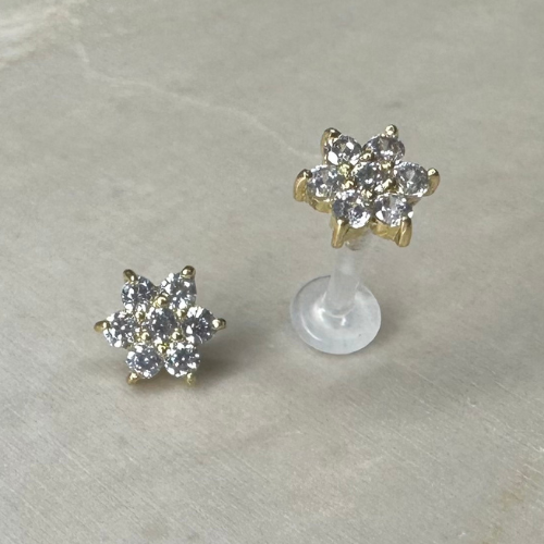 Yellow gold piercing with flower and zirconium oxide