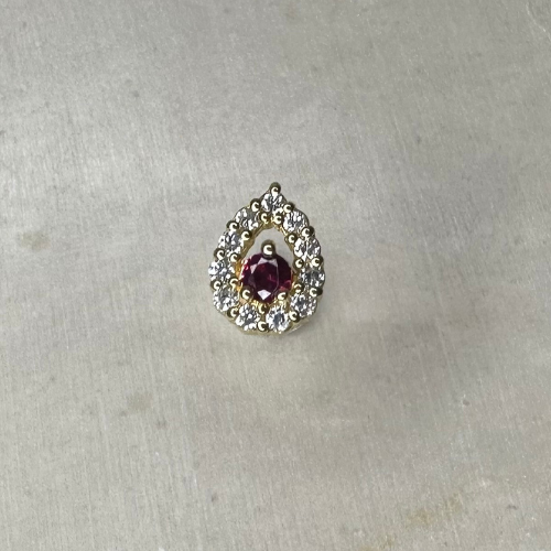 Piercing or jaune avec rubis et oxydes de zirconium