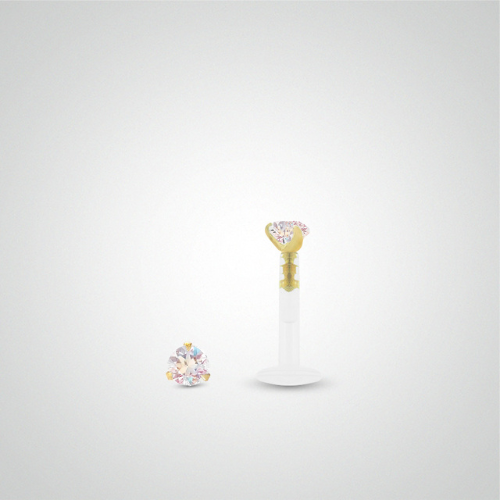 Yellow gold piercing with iridescent zirconium oxide