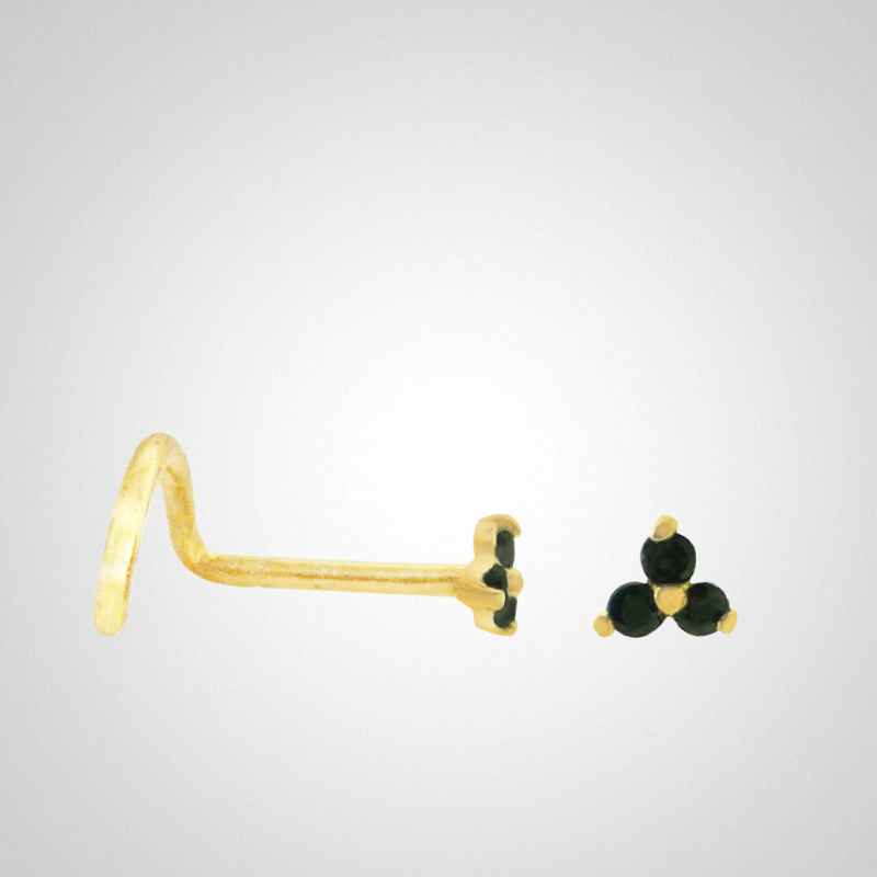 Yellow gold nose piercing with three black zircons