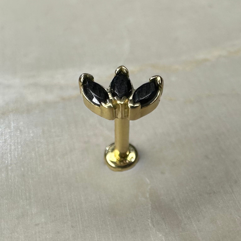 Orphéa black 18-carat yellow gold ear piercing