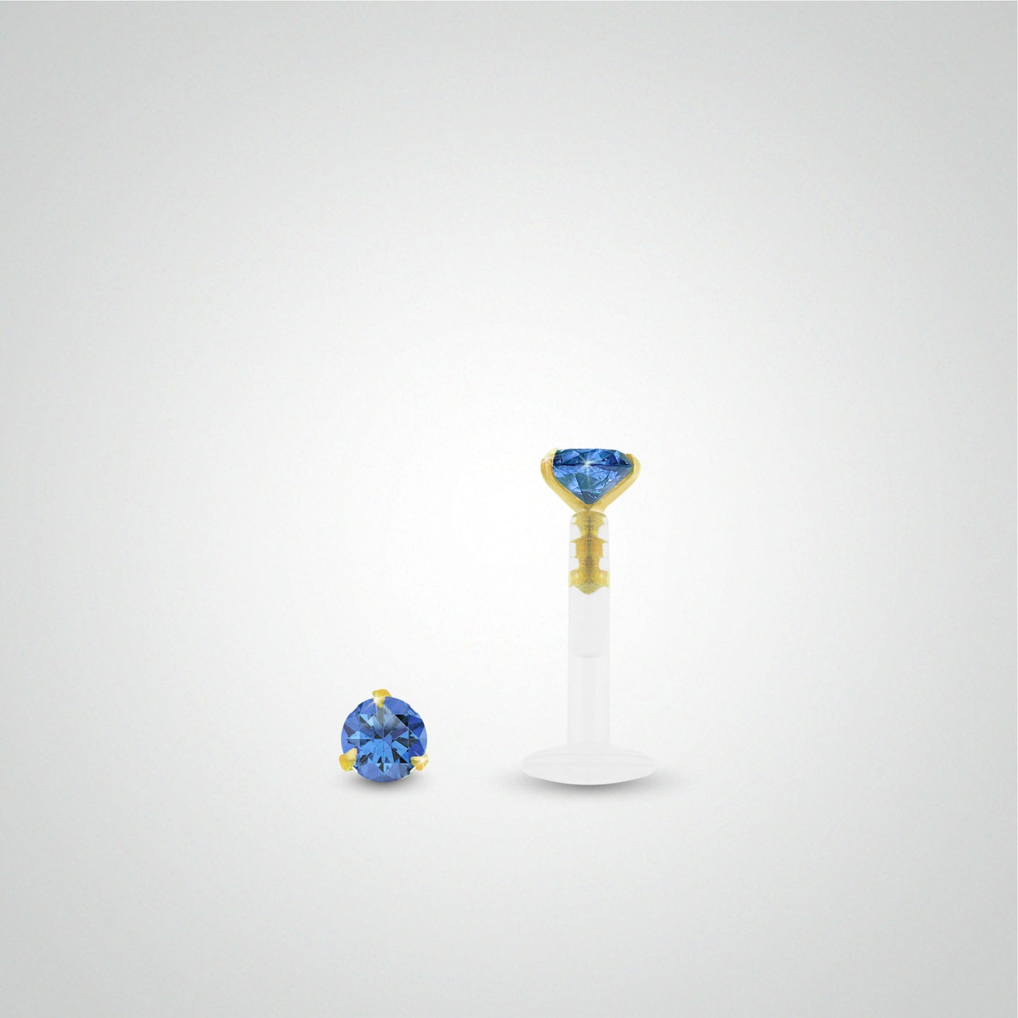 Yellow gold and dark blue zirconium oxide anti-helix piercing