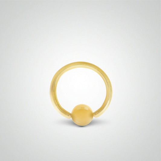 Piercing anneau avec boule en or jaune (1,2mm)