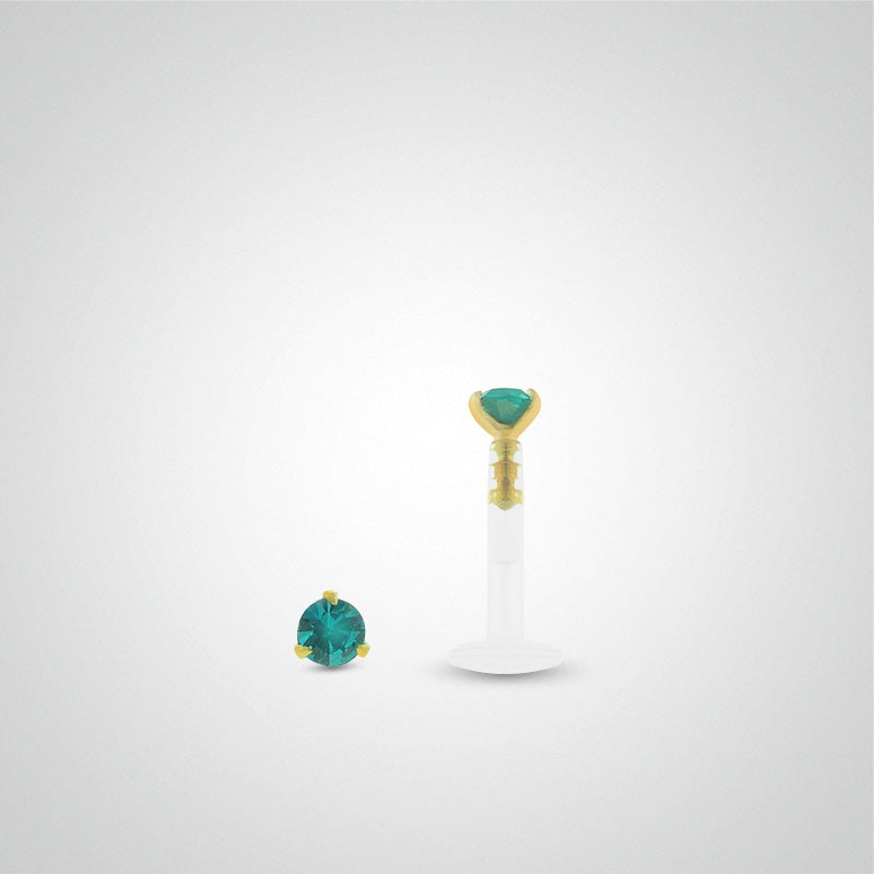 Piercing tragus or jaune avec oxyde de zirconium turquoise