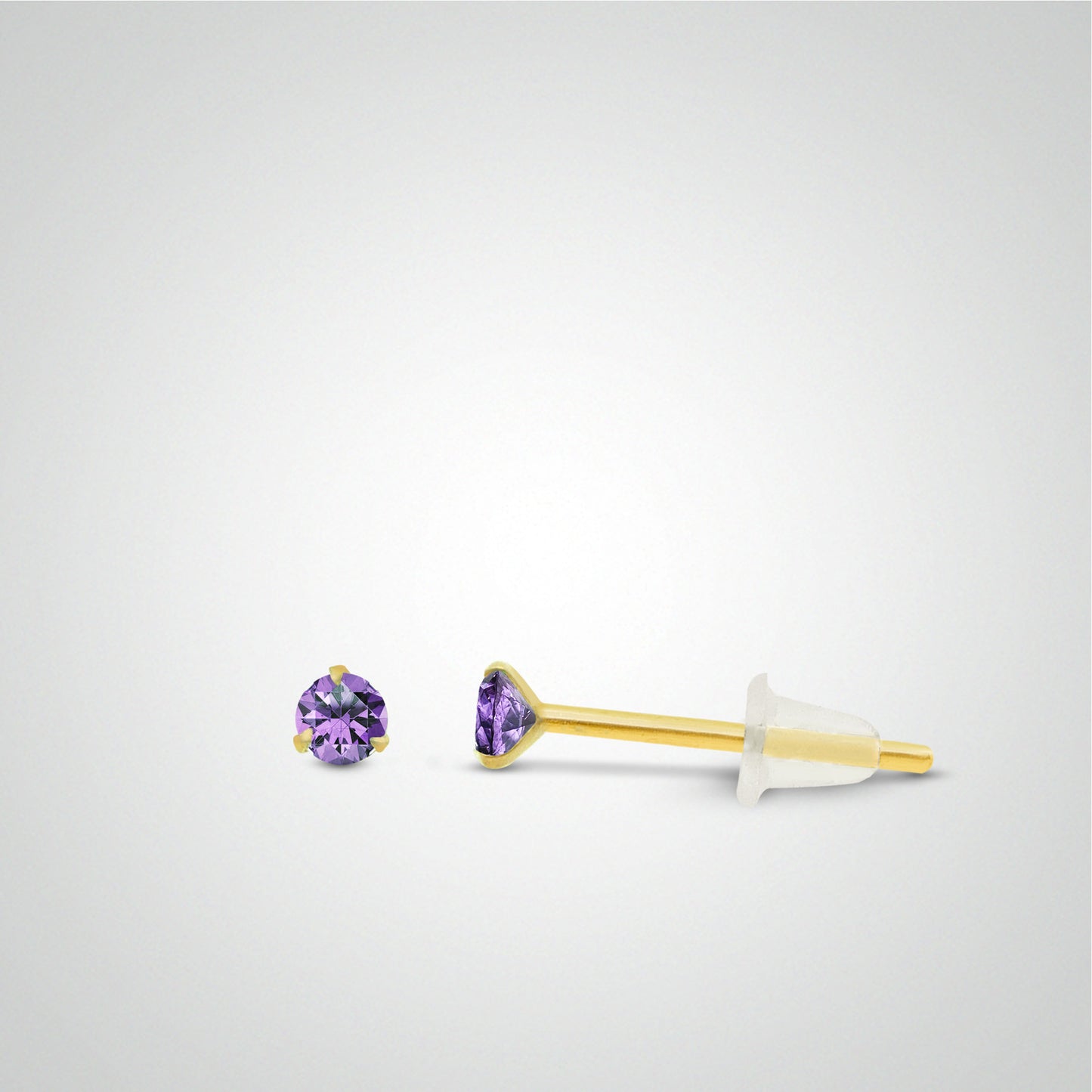 Boucle d'oreille en or jaune avec zircon mauve