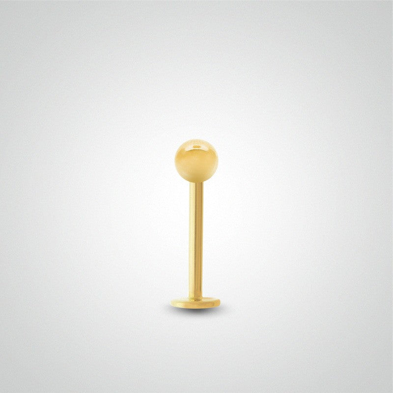 Yellow gold earring with ball