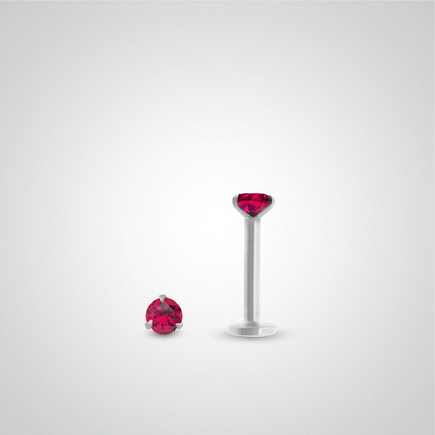0.05 carat ruby earring in white gold