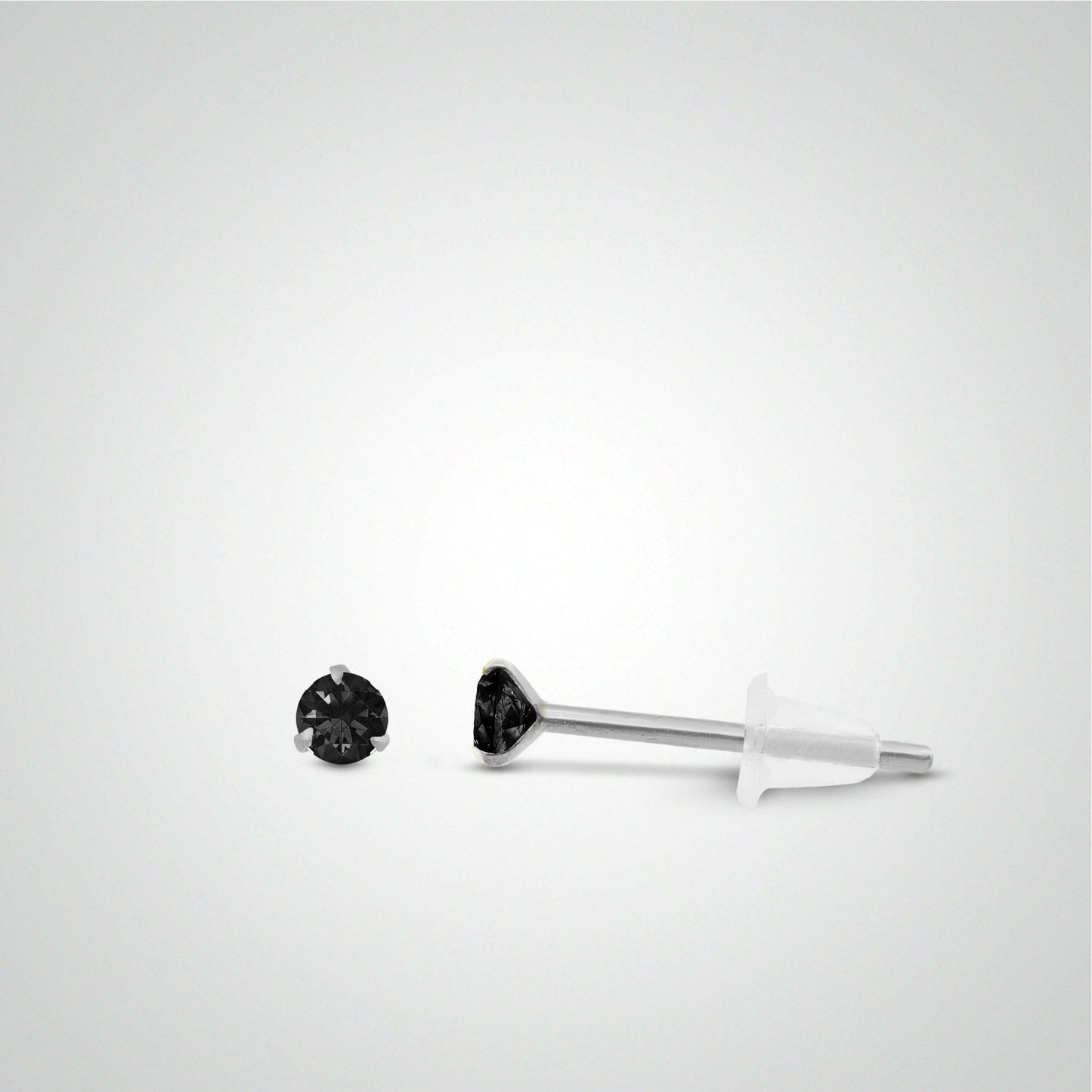 White gold earring with black zircon