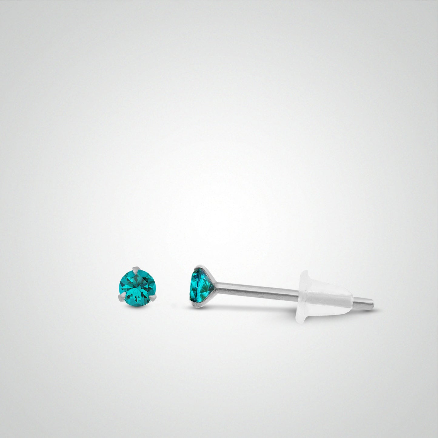 Boucle d'oreille en or blanc avec zircon turquoise