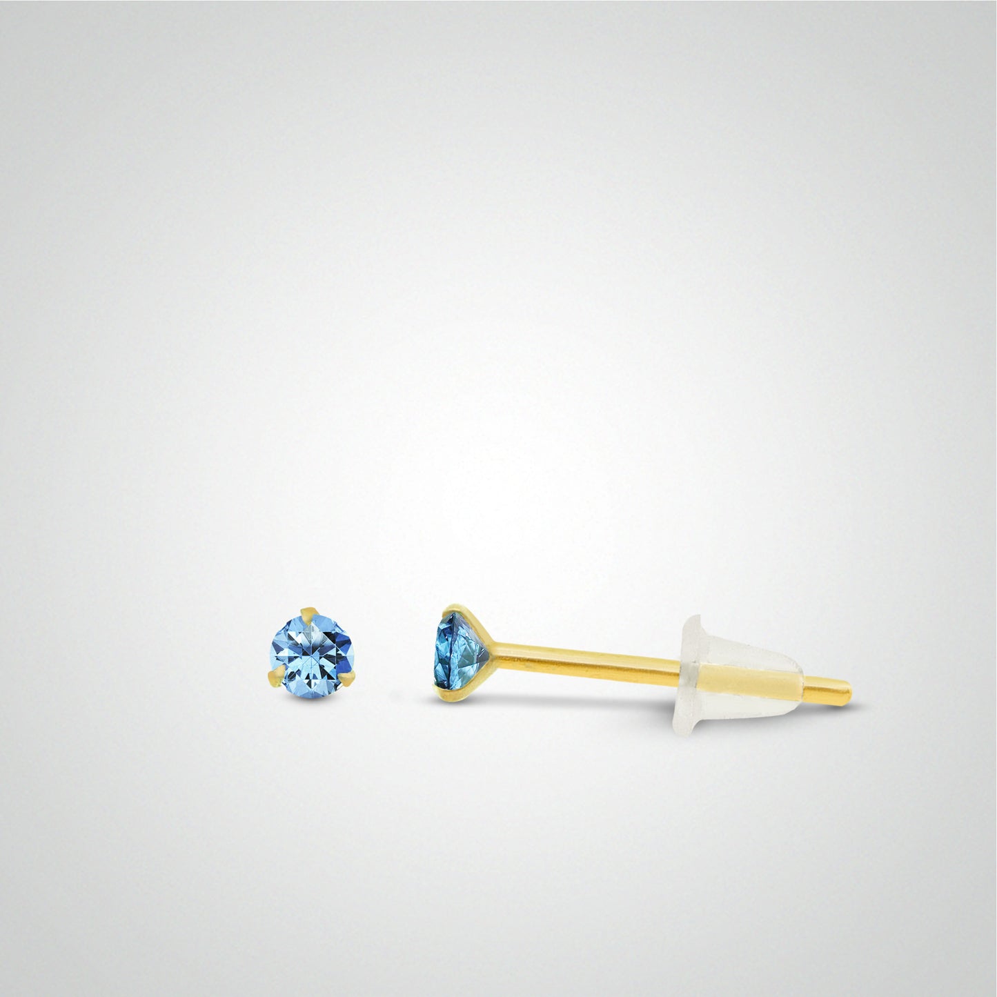 Boucle d'oreille en or jaune avec zircon bleu clair