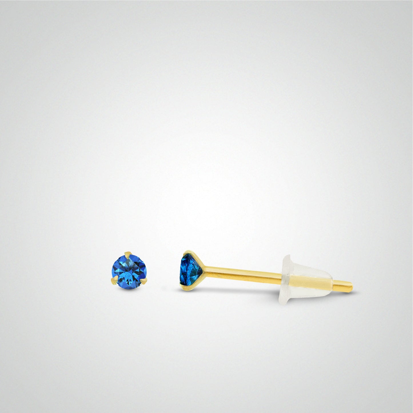 Yellow gold earring with dark blue zircon