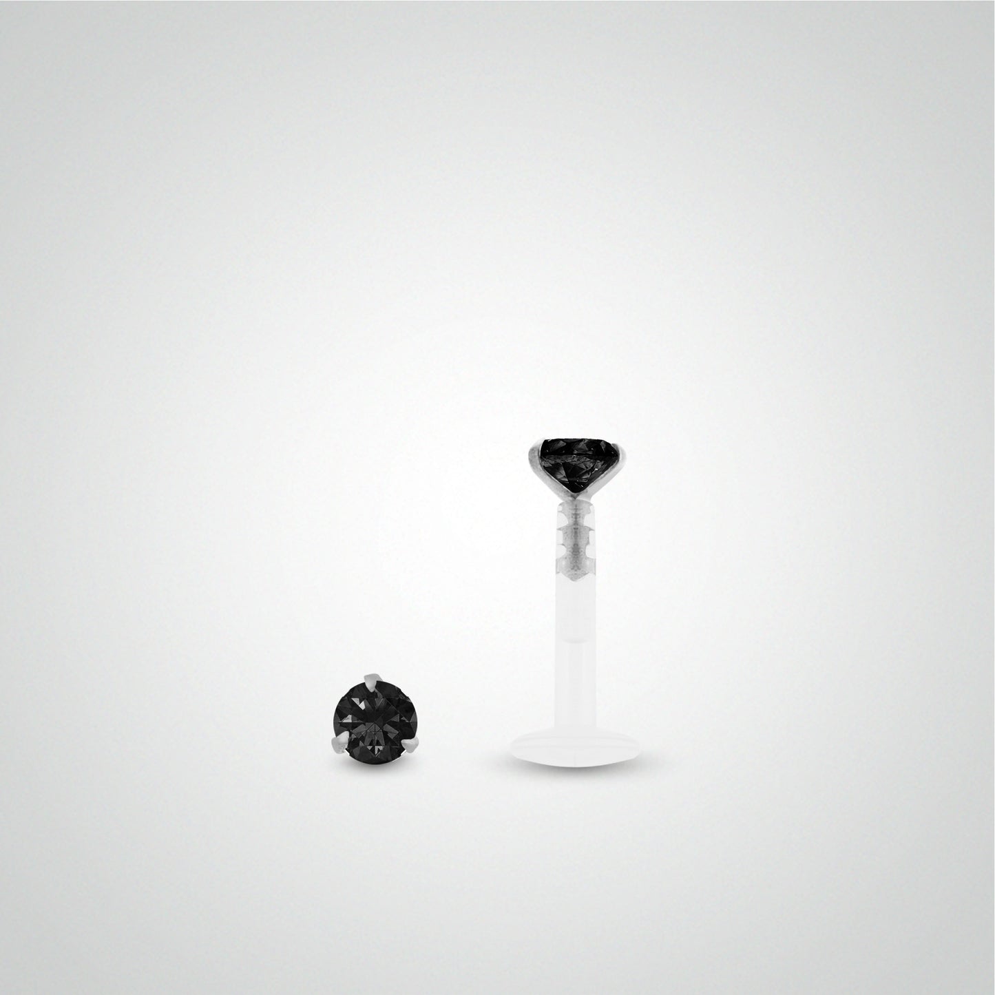 White gold anti-helix piercing with black zirconium oxide