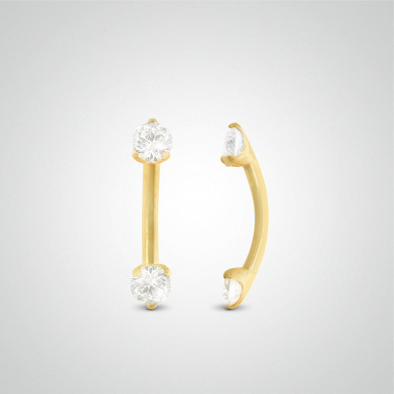 Yellow gold eyebrow piercing with two 3mm zircons
