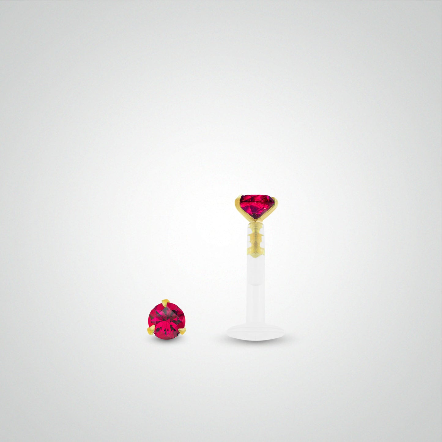 Conch piercing with 0.05 carat ruby in yellow gold
