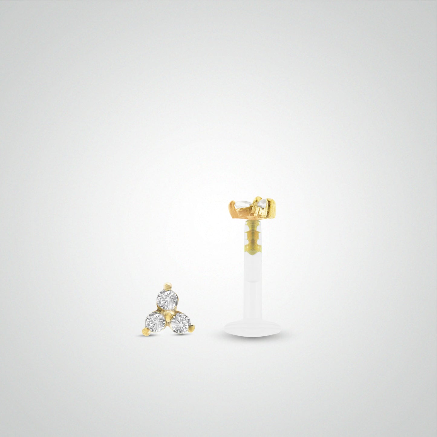 Piercing conch or jaune avec trois oxydes de zirconium