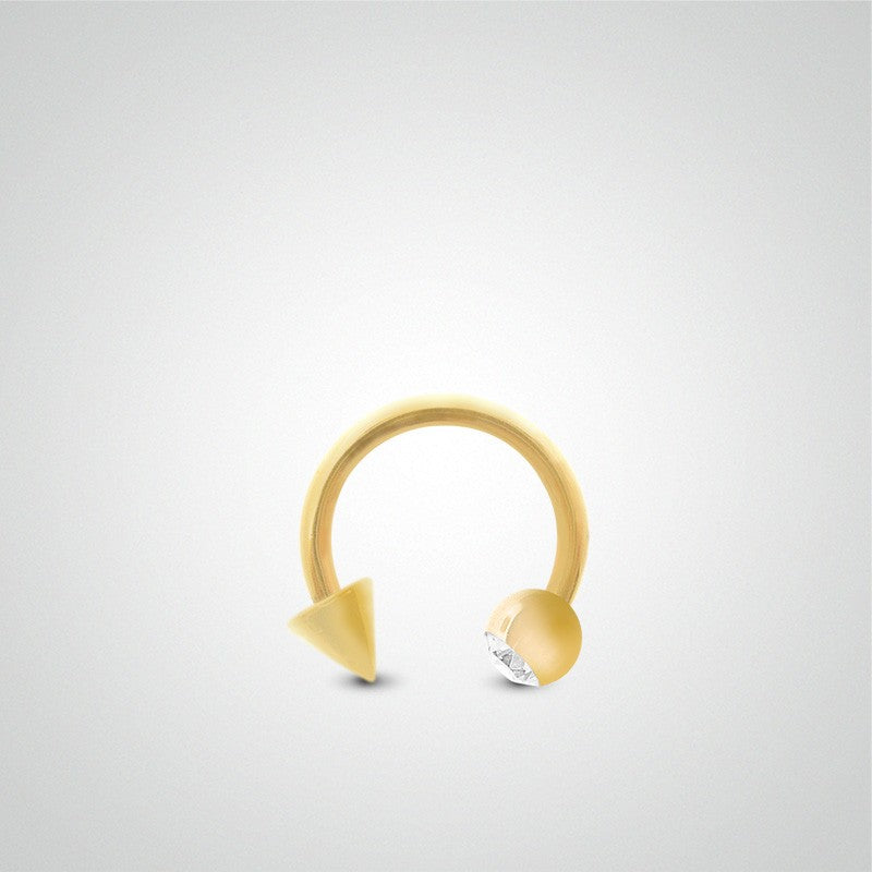 Yellow gold rook and daith piercing: horseshoe with ball and spike (1.2mm)