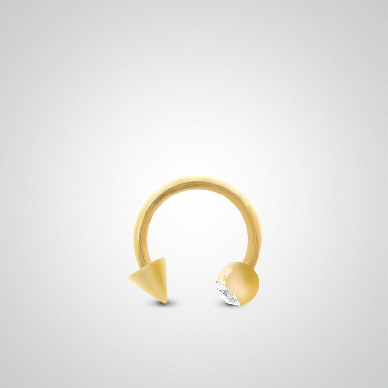 Yellow gold horseshoe piercing with set ball and spike (1.2mm)