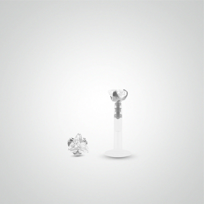 White gold helix piercing with a triangle zirconium oxide