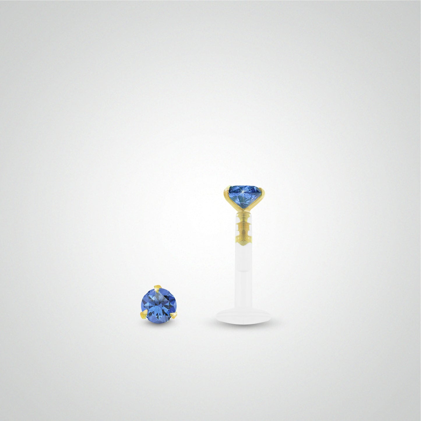 Piercing hélix or jaune avec oxyde de zirconium bleu foncé