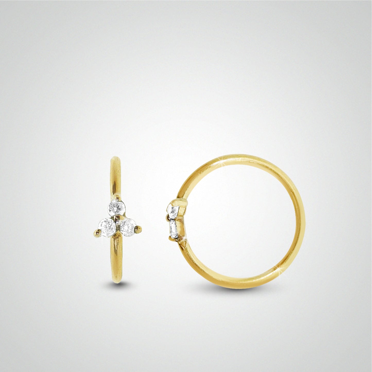 Yellow gold nose ring piercing to spread with zircon clover