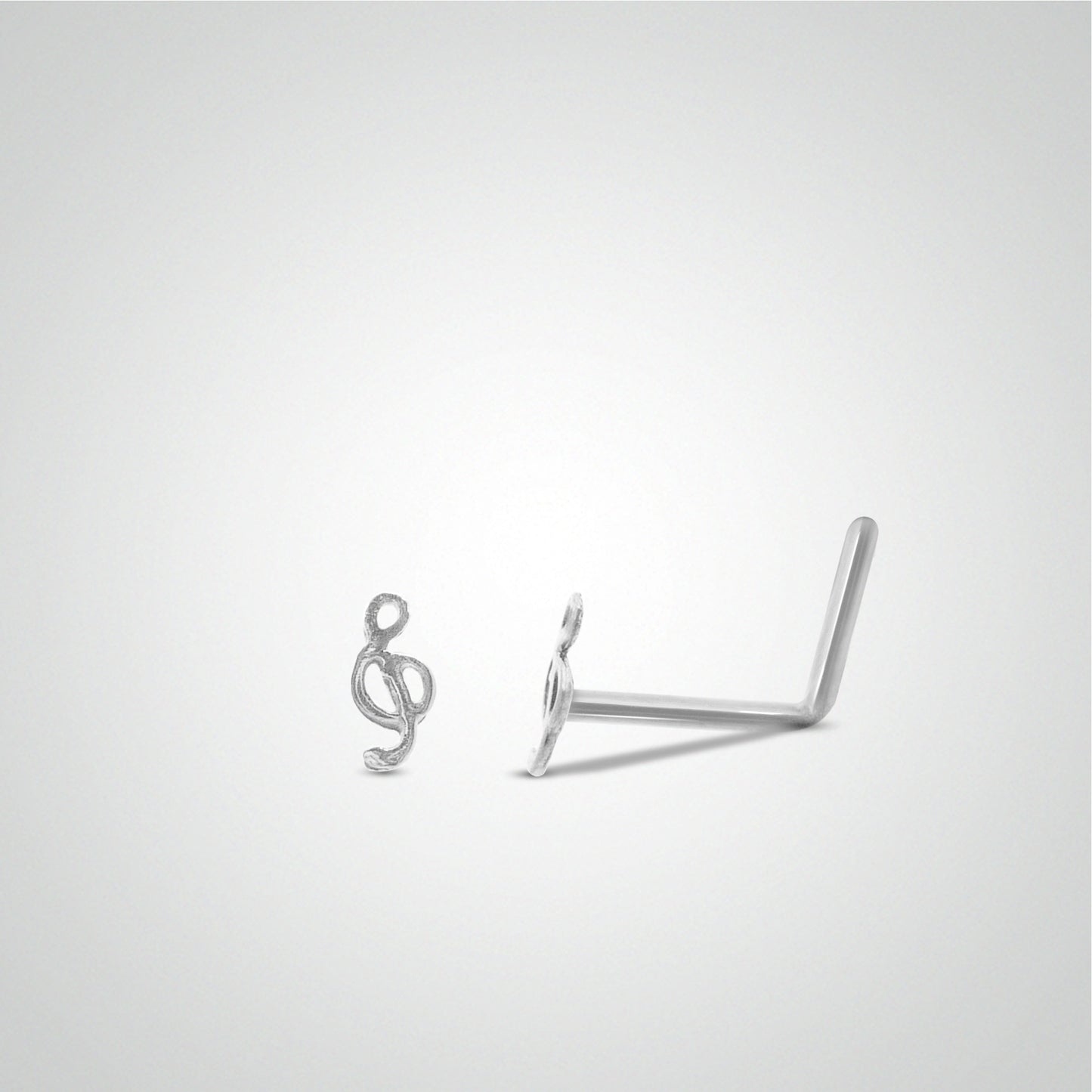 White gold treble clef nose piercing