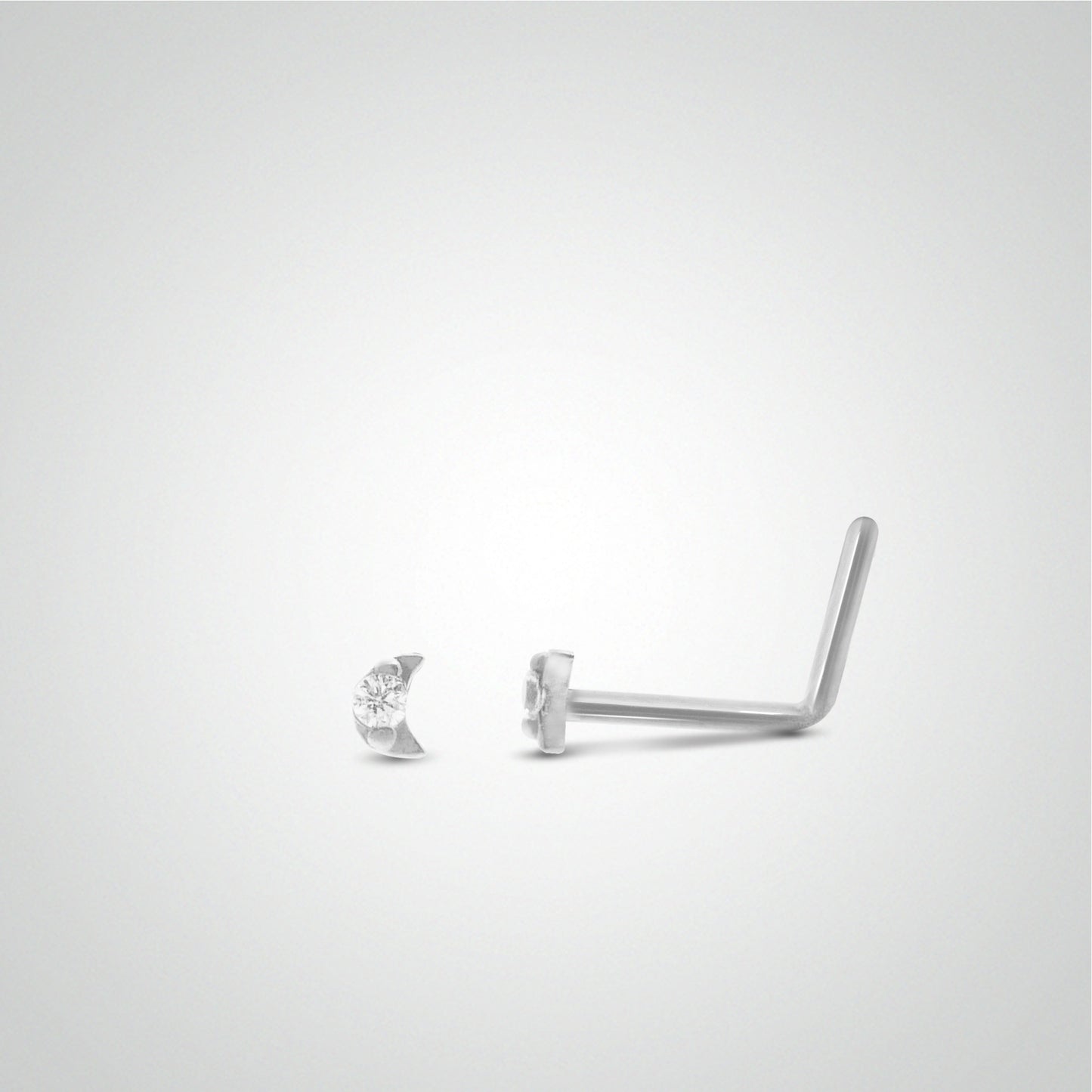 White gold nose piercing with moon and zircon