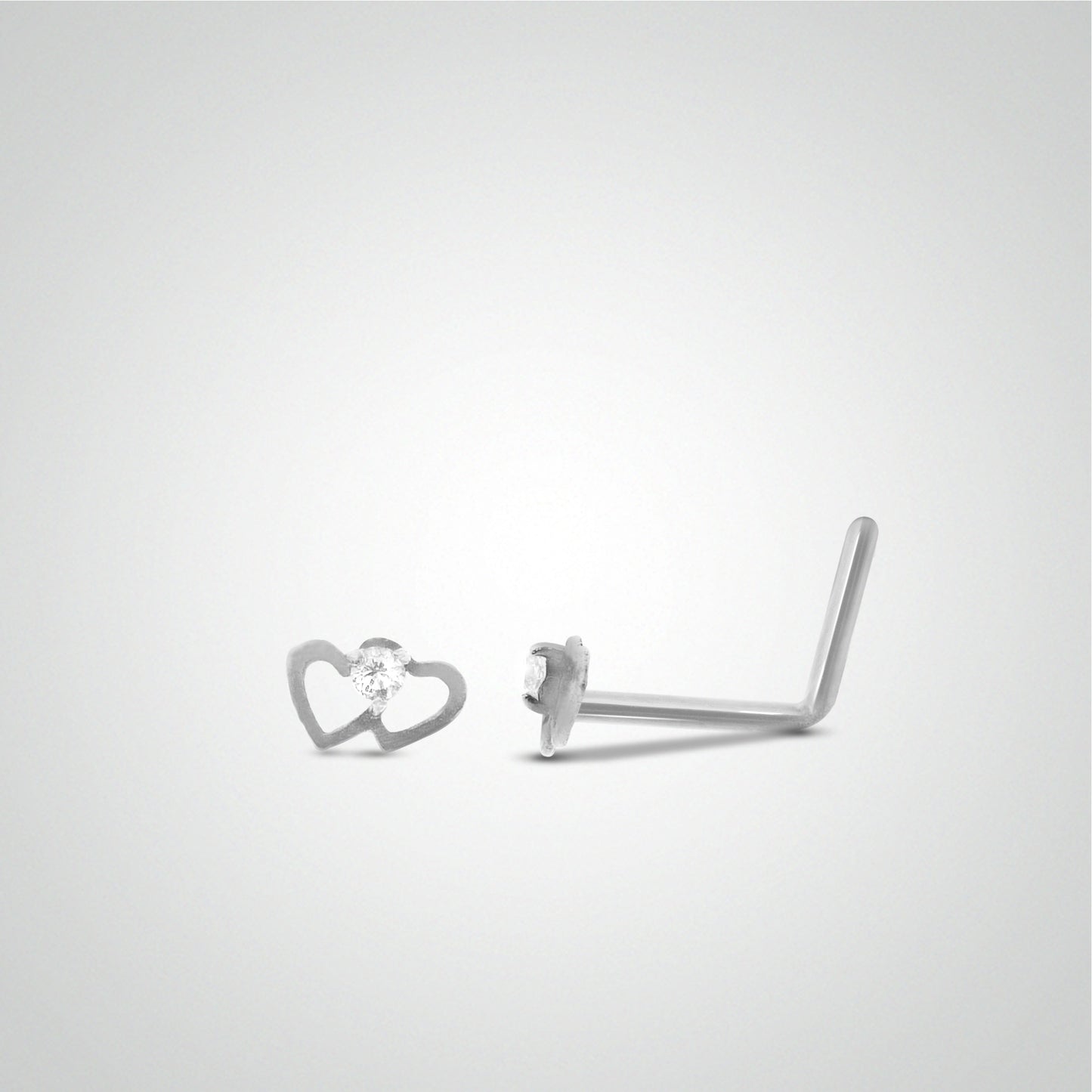 White gold heart nose piercing