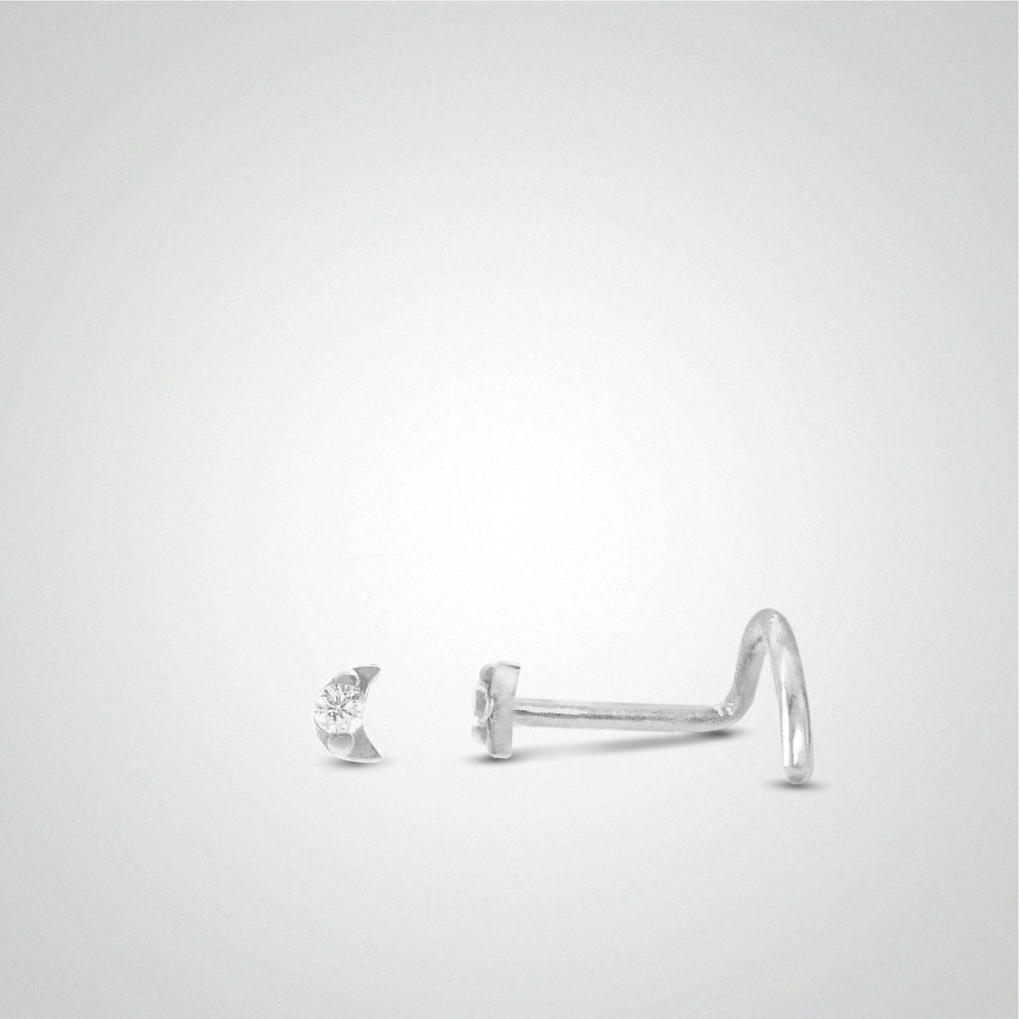 White gold nose piercing with moon and zircon