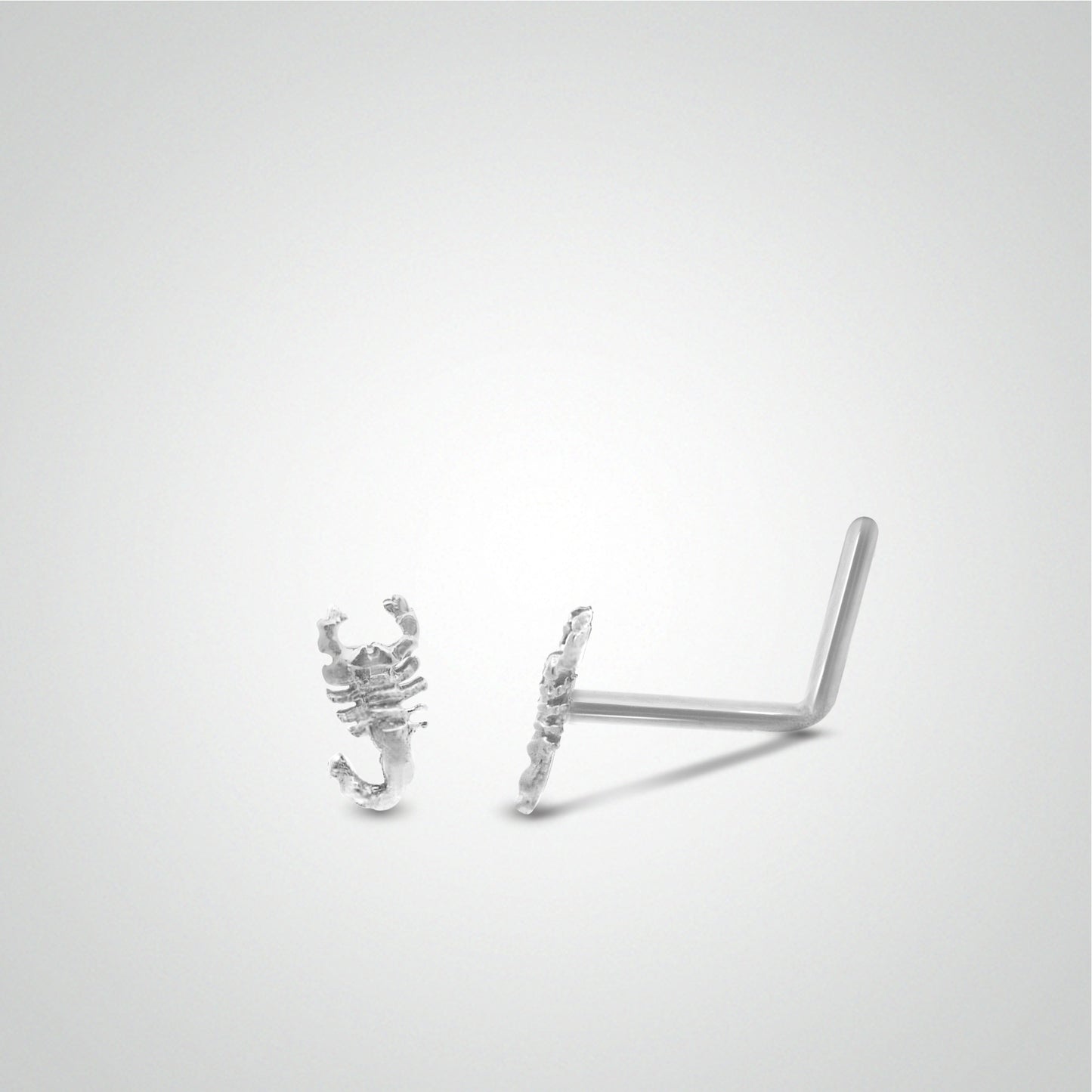 White gold scorpion nose piercing
