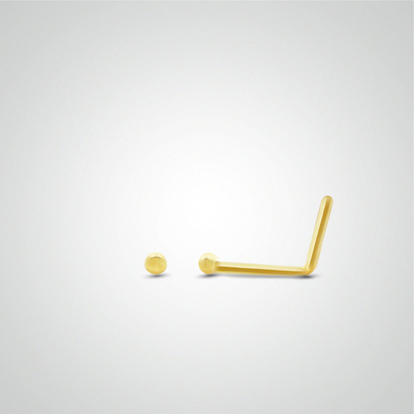 Yellow gold ball nose piercing