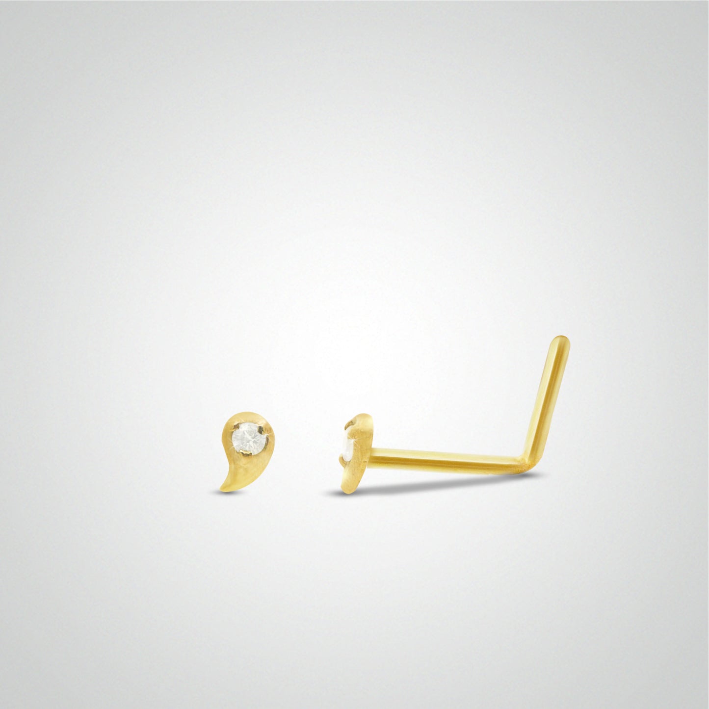 Yellow gold drop nose piercing
