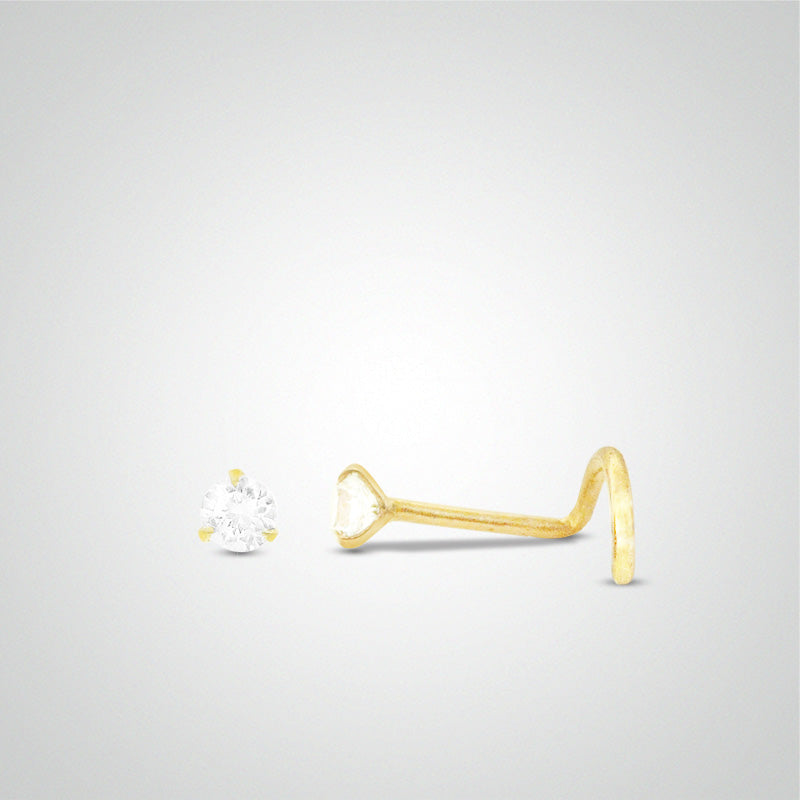 White zircon nose piercing with yellow gold