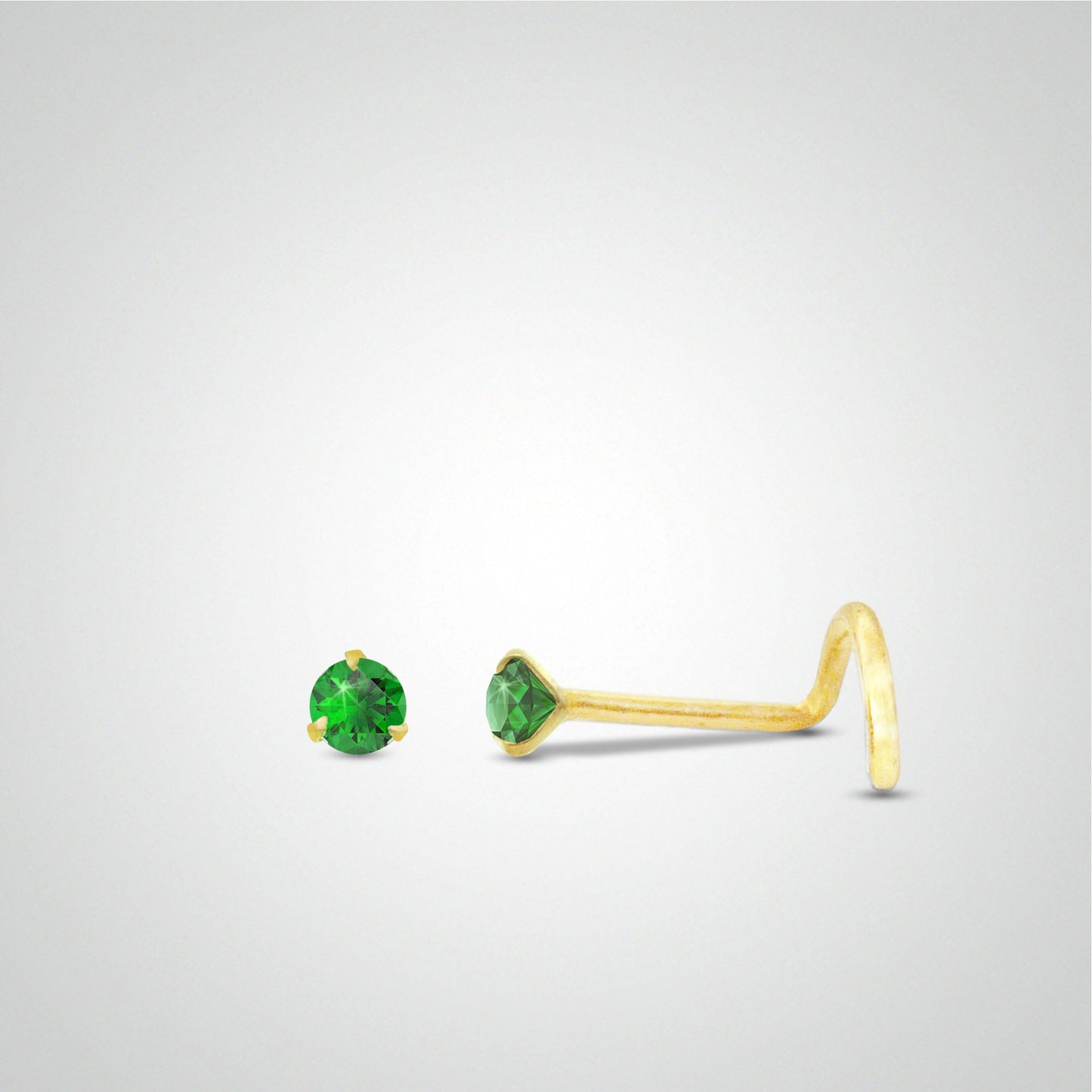 Yellow gold emerald nose piercing