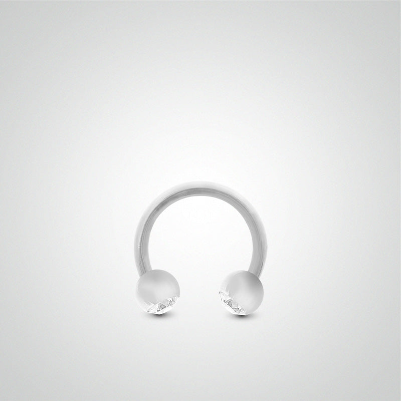 White gold sex piercing: horseshoe with balls and oxides and zirconium (1.2mm)