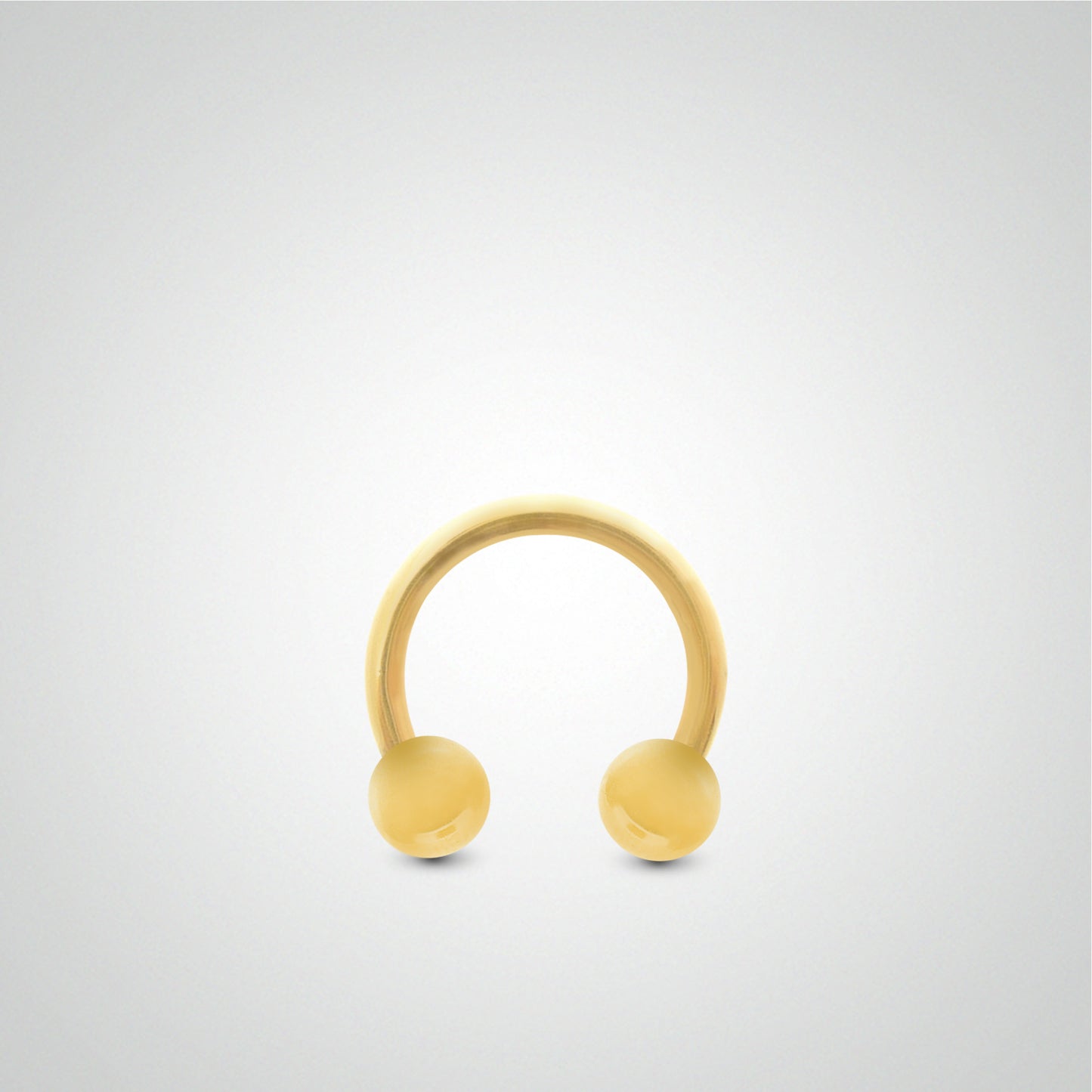Yellow gold penis piercing: horseshoe with balls (1.2mm)
