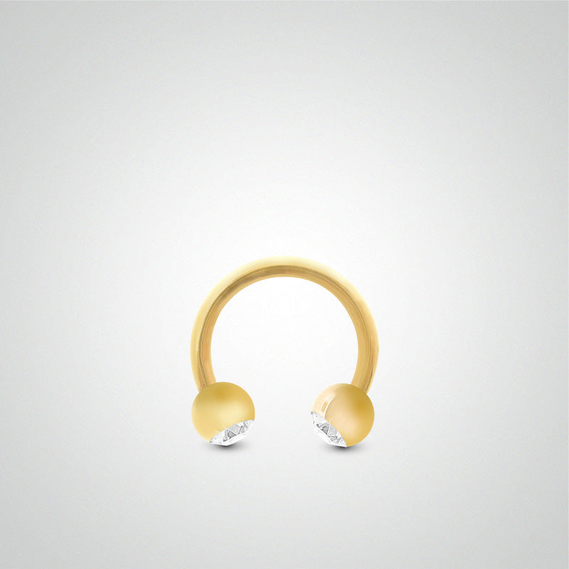 Yellow gold penis piercing: horseshoe with balls and zirconium oxides (1.6mm)