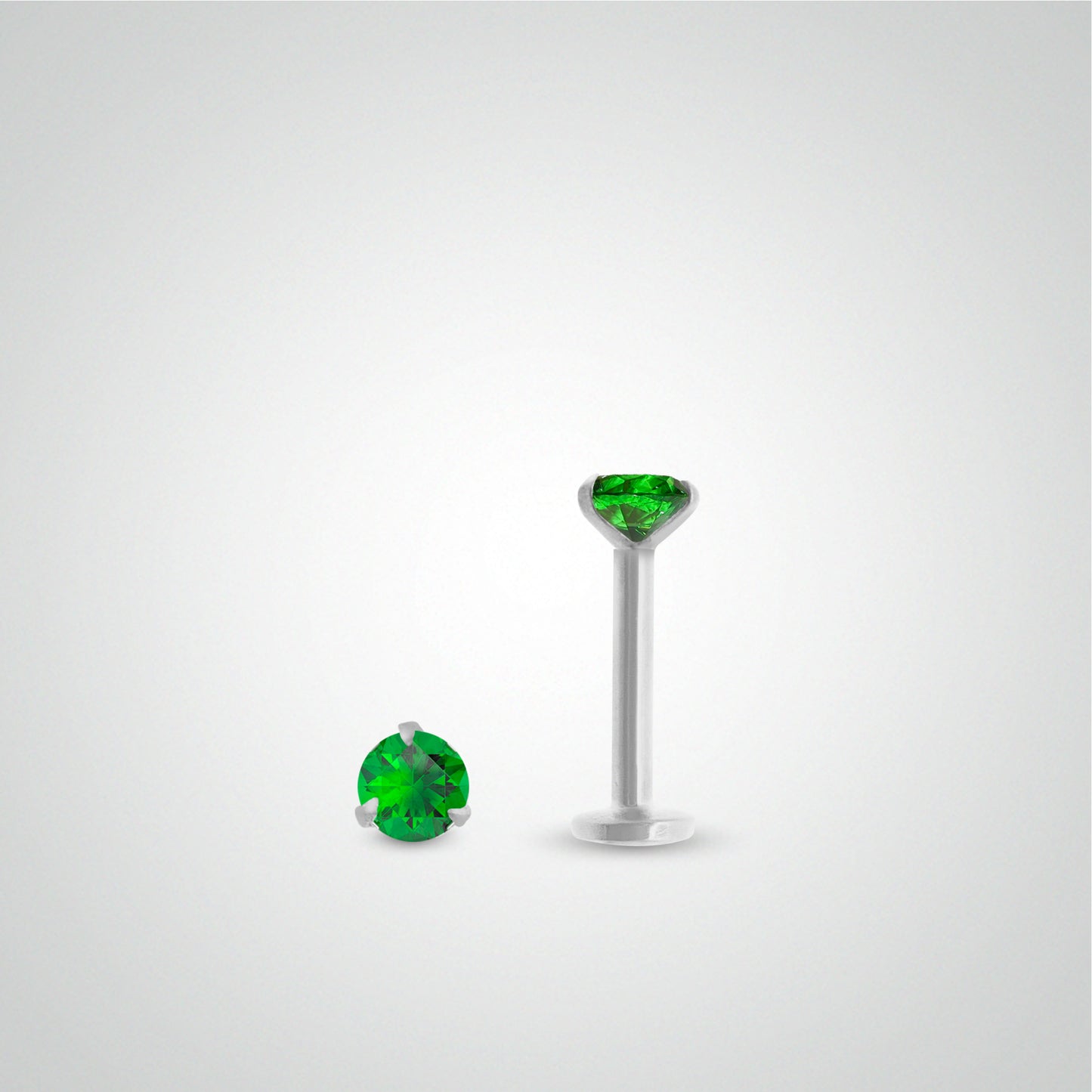 Piercing de tragus émeraude 0,10 carats en or blanc (vissable)