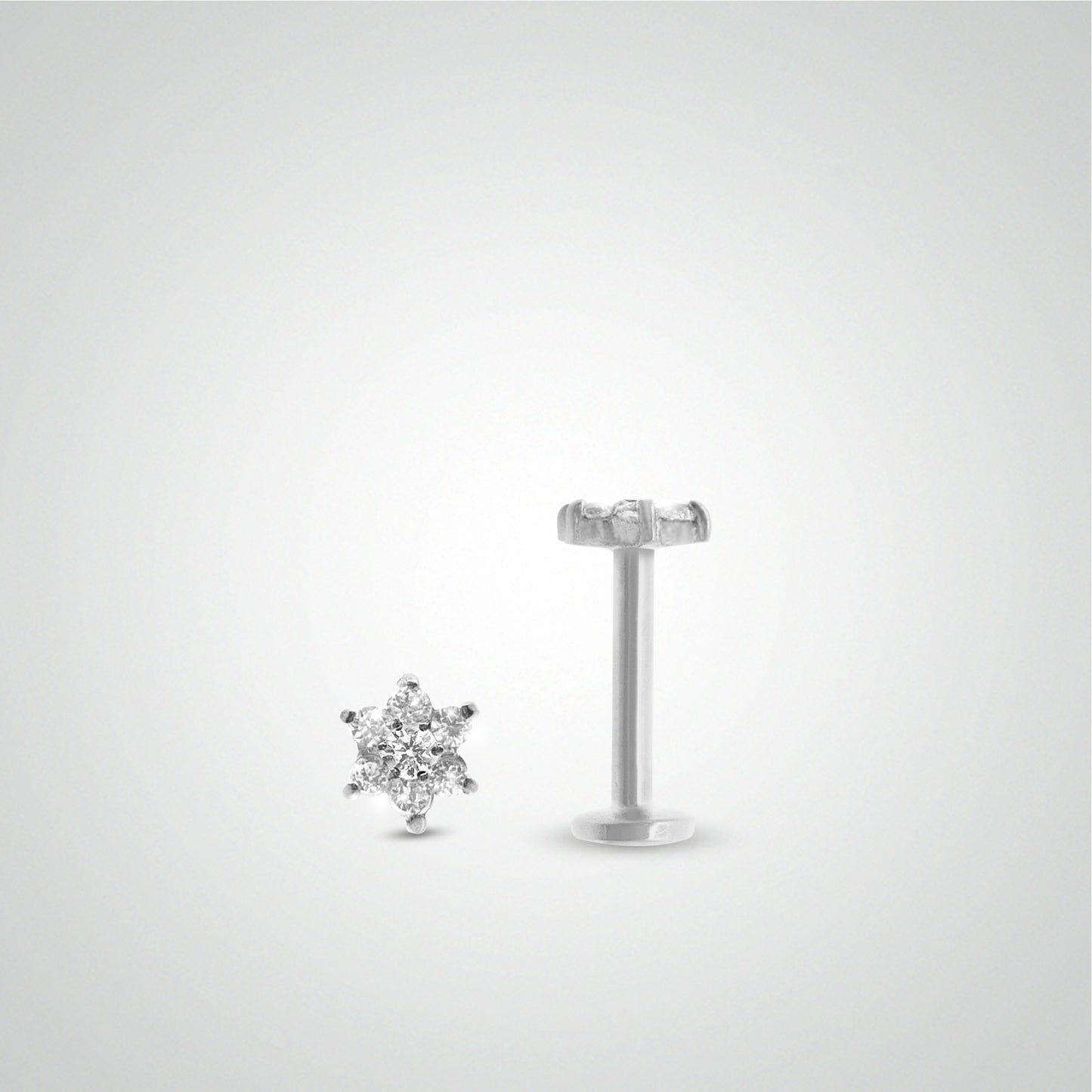 Piercing tragus fleur en or blanc avec zircons blancs (vissable)