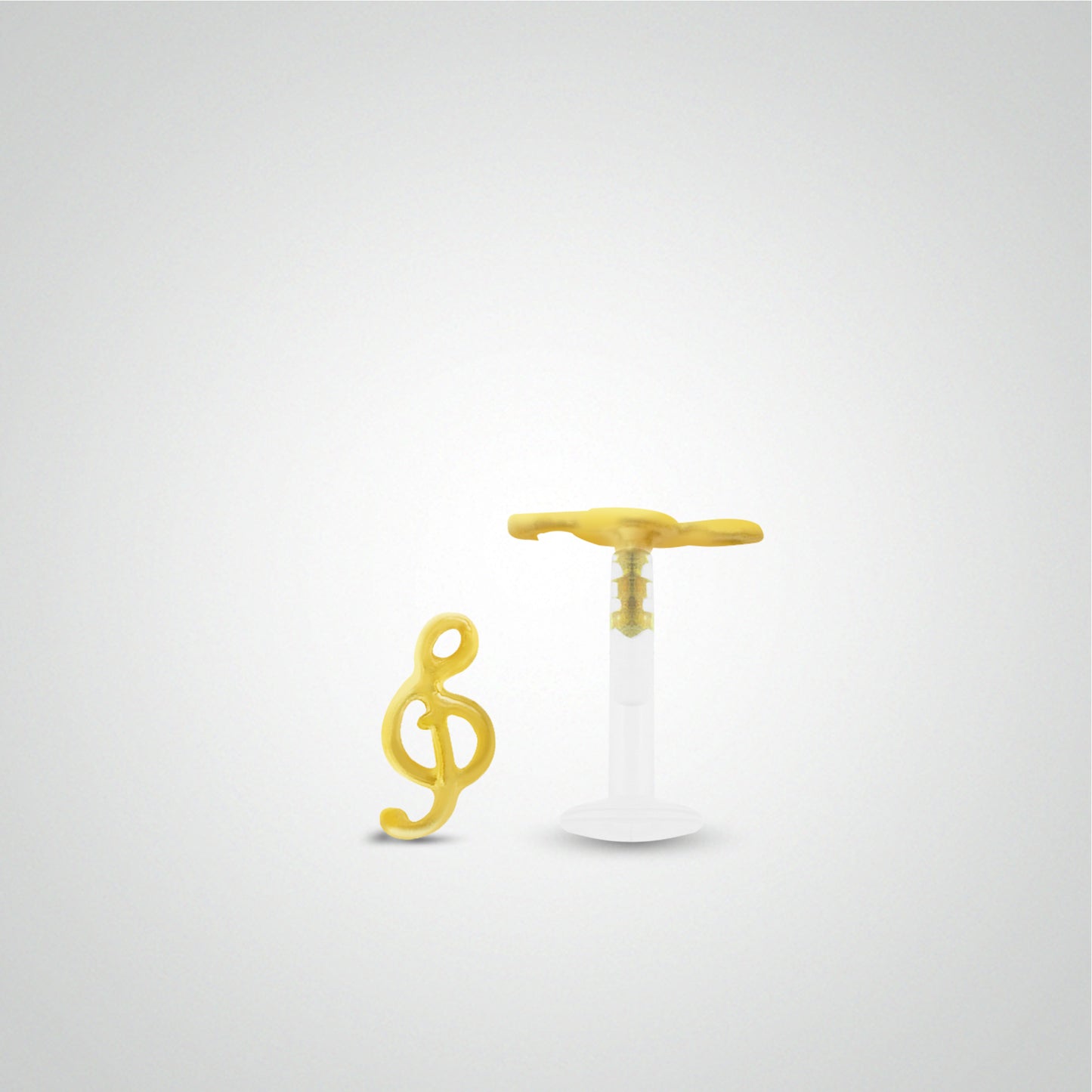 Piercing tragus clef de sol en or jaune