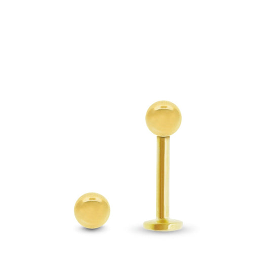 Piercing en or jaune avec barre labret et boule vissable pour le lobe