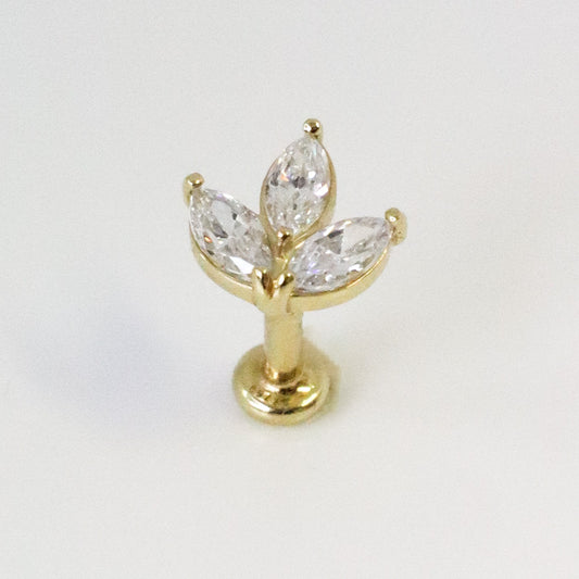 Piercing oreille or jaune 18 carats fleur et zircons