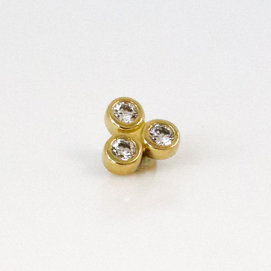 Piercing or jaune avec trois zircons blancs sertis