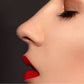 Yellow gold moon nose piercing