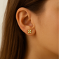 Piercing d'hélix croix avec oxydes de zirconium sertis en or jaune