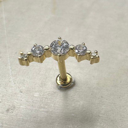 Piercing cartilage barrette courbée or jaune avec zircons