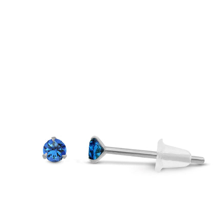 Boucle d’oreille élégante en or blanc avec zircon bleu marine brillant